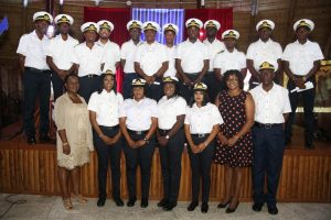 Making history: Graduates Sheryl Wilson, Vanessa Merchant, Abiola Hickson, and Sabita Sukhdeo, who are flanked by Maritime Administration Department (MARAD) Director General Claudette Rogers (at left), Junior Infrastructure Minister Annette Ferguson (second, from right) and Harbour Master Michael Tennant, have made history by becoming the country’s first female marine pilots. They were among the first batch of 16 marine pilot cadets who graduated from a five-year MARAD training programme last Friday at the Umana Yana. (Photo by Keno George)