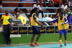 Dynamic Duo- Gerald Gittens (left) and Travis Grant are all smiles after their team eliminated Sparta Boss from the Guinness Cage Football Championship following a 2-0 at the National Gymnasium Thursday night.