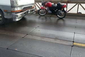 The Canter truck and Halley’s bike which collided on Tuesday on the Demerara Harbour Bridge 