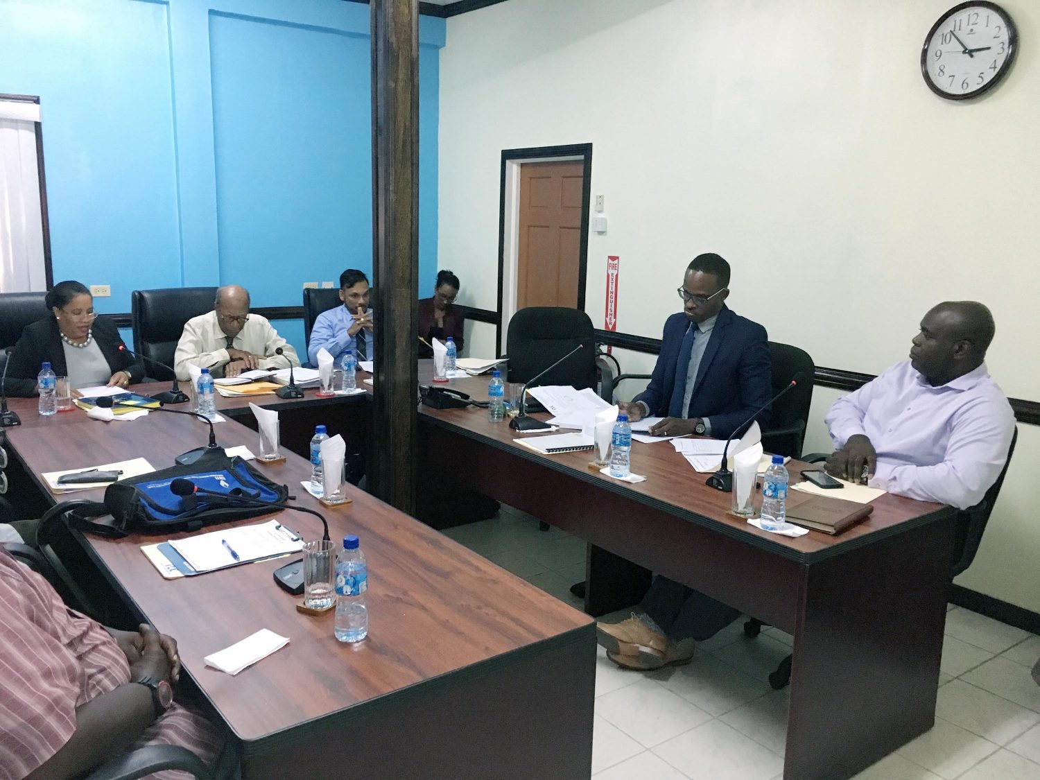 The PUC  hearing yesterday at the PUC Office at New Garden Street, Queenstown. From left to right, PUC Chairman Dela Britton, Commissioner Maurice Solomon, PUC Secretary Vidiahar Persaud,  GTT attorney Mark Reynolds and GTT CEO Justin Nedd (Dhanash Ramroop photo)
