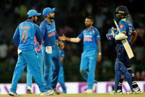 India’s team captain Virat Kohli celebrates with his teammates next to team captain Lasith Malinga of Sri Lanka after they winning the match against Sri Lanka (Dinuka Liyanawatte)