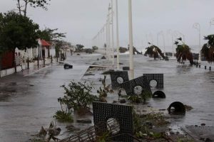 Debris lies on a flooded seafront after the passage of Hurricane Maria in Basse-Terre, Guadeloupe island, France, on Tuesday. (Reuters) 