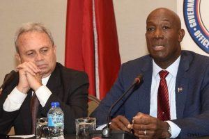 Prime Minister Dr Keith Rowley answers a question following the “Spotlight on Trinidad and Tobago’s Financial Circumstances: The Road Ahead” event at the Hyatt Regency (Trinidad) hotel in Port of Spain yesterday. At left is Finance Minister Colm Imbert. (Trinidad Express photo)