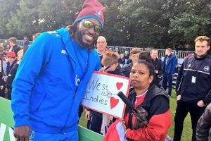 Superstar opener Chris Gayle poses with a fan during the abandoned ODI against Ireland. (Photo courtesy CWI Media) 