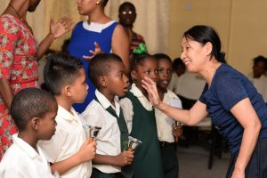 Japan International Co-operation Agency (JICA) instructor, Yuko Aoki singing along with the St. Sidwell Primary School students
