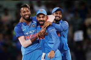 Hardik Pandya, Virat Kohli and Kedar Jadhav (L-R) of India celebrate the dismissal of team’s captain Steven Smith of Australia. (REUTERS/Adnan Abidi)