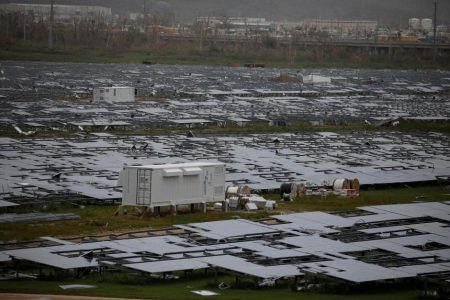 Damaged solar panels are seen after the area was hit by Hurricane Maria in Humacao, Puerto Rico on September 22, 2017.