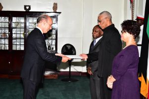 Ambassador Javier Maria Carbajosa Sanchez (left) presenting his Letters of Credence to President David Granger in the presence of Minister of Foreign Affairs, Carl Greenidge and Director-General in the Ministry of Foreign Affairs, Audrey Waddell. (Ministry of the Presidency photo)