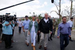 U.S. President Donald Trump and first lady Melania Trump walk through a neighborhood damaged by Hurricane Maria in Guaynabo, Puerto Rico, U.S., October 3. (Reuters photo)