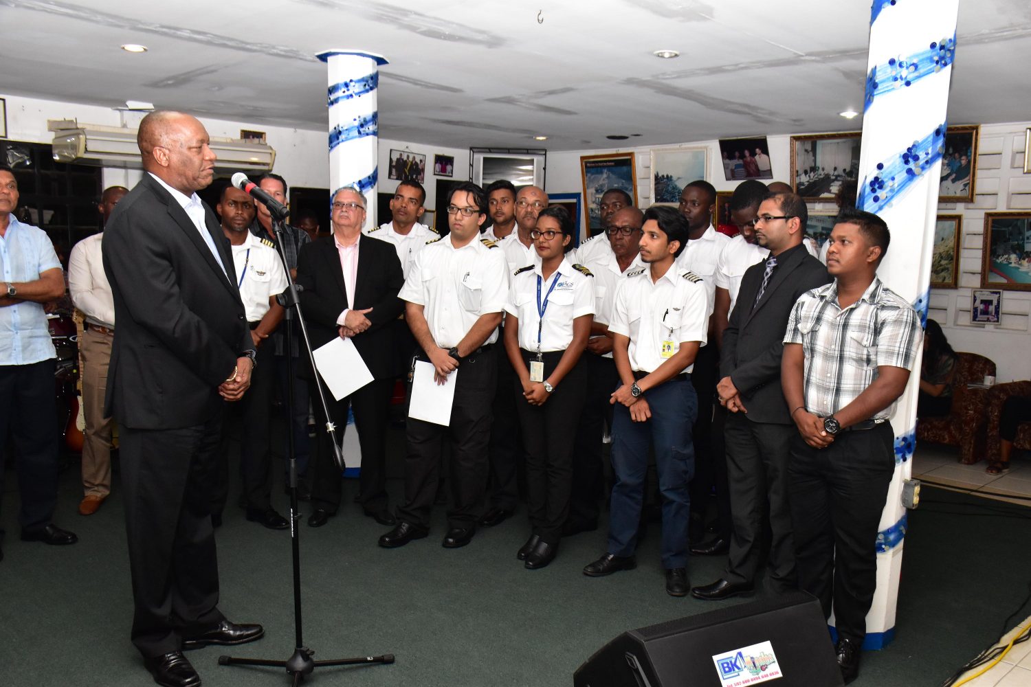 Minister of State, Joseph Harmon addresses pilots and engineers who successfully completed the training at the graduation ceremony (Ministry of the Presidency photo)
