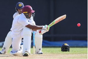 Windies “A” batsman Sunil Ambris sweeps during his second hundred of the series against Sri Lanka “A”. The wicketkeeper is Sundan Weerakkody. (CWI Photo/Athelstan Bellamy)
