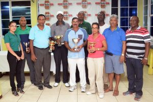 The top performers at yesterday’s Banks DIH Limited/Citizens Bank golf tournament with representatives from the two sponsors and the Lusignan Golf Club. (Orlando Charles photo)

