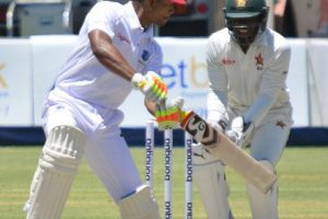 Opener Kieran Powell cuts en route to his top score of 90 on the third day of the second Test against Zimbabwe yesterday. (Photo courtesy CWI Media)