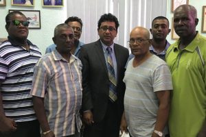 Attorney at law Anil Nandlall (at centre) with some members of the Parika/ Wakenaam/ Supenaam Speed Boat Association.