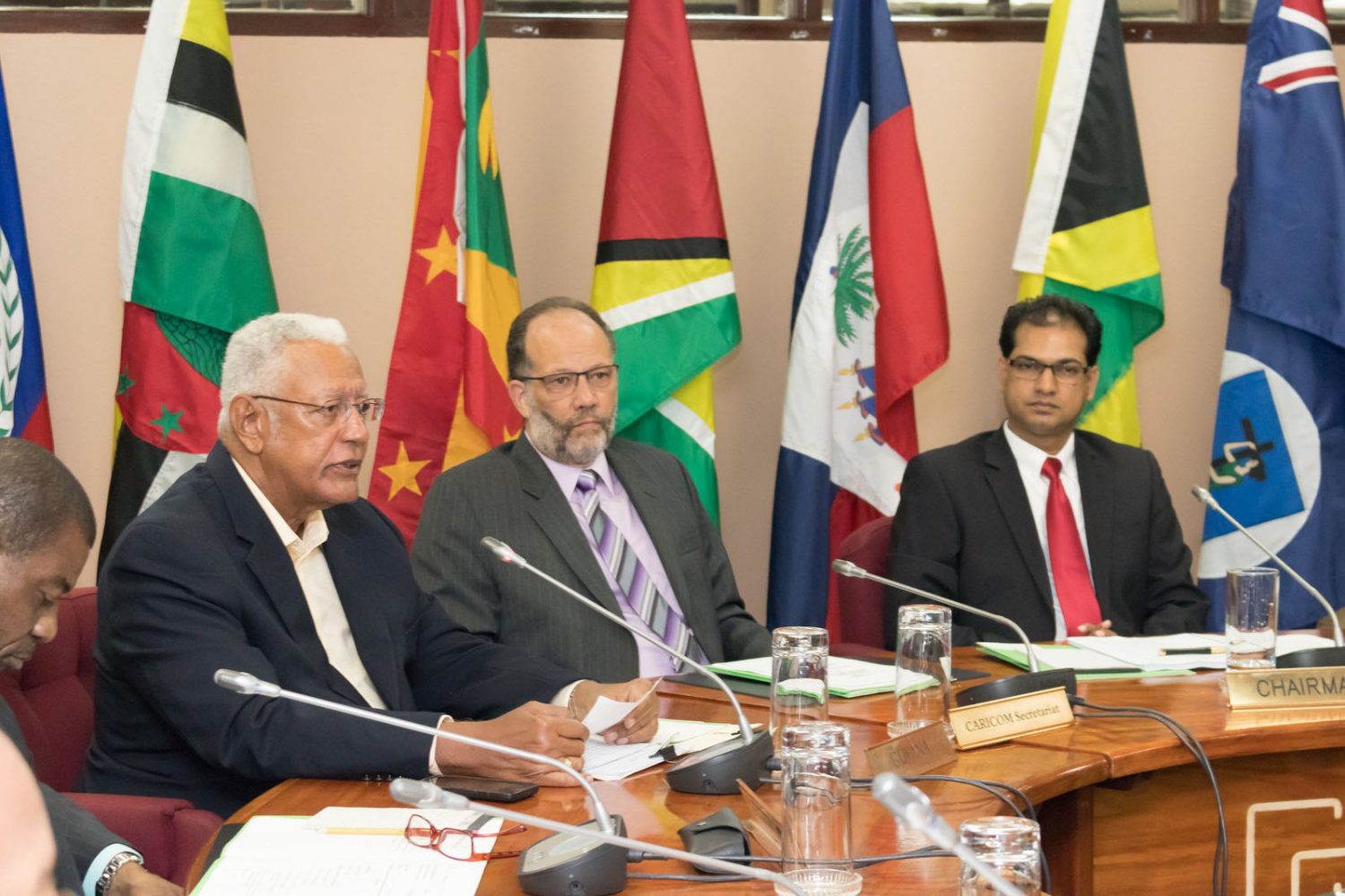 Minister of Agriculture of Guyana, Noel Holder (left), delivering remarks at the meeting. Also in photo are CARICOM Secretary-General, Ambassador Irwin LaRocque (centre), and Chair of the Meeting, Minister of Agriculture, Animal Husbandry and Fisheries of Suriname, Soeresh Algoe. (CARICOM photo)