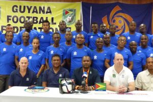 Participants for the CONCACAF D License course posing with CONACACF Instructors Vincent Ganzberg (sitting first left) and Antony Corneal (sitting second left) as well as GFF President Wayne Forde (sitting centre), GFF Technical Director Ian Greenwood (sitting second right) and GFF Executive Committee Member Keith O’Jeer following the launch of the CONCACAF D License programme.