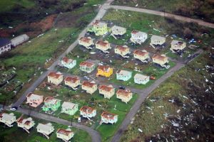 Roofs were stripped from houses on the island of Dominica on Sept. 19. Nigel R. Browne / Caribbean Disaster Emergency Management Agency via Reuters
