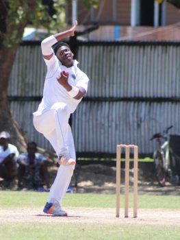 The 16-year-old left-arm spinner Ashmead Nedd got good purchase on a wearing pitch during his damaging spell against West Demerara yesterday. (Royston Alkins photo) 