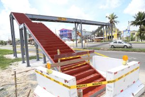 The pedestrian overhead pass at Providence, East Bank Demerara, is almost completed as the Ministry of Public Infrastructure installed the access stairs yesterday. The overhead pass at Providence is one of three being built along the East Bank of Demerara to facilitate pedestrians crossing the busy highway. (Photo by Keno George)