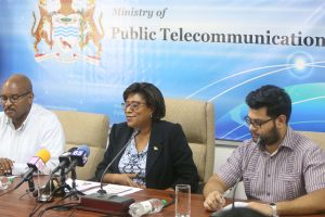 Minister of Public Telecommunications Cathy Hughes (centre) along with the Head of the Industry and Innovation Unit in the Ministry Lance Hinds (left) and Kevin Roopchand of MoPT on Friday (Keno George photo)