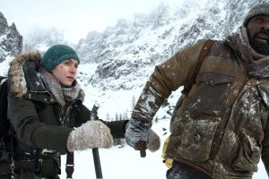 Kate Winslet and Idris Elba in a scene from “The Mountain Between Us”
