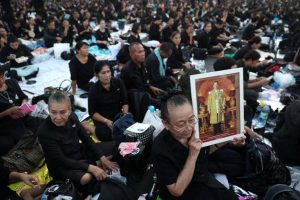 Mourners wait for the start of the funeral procession for Thailand’s late King Bhumibol Adulyadej before the Royal Cremation Ceremony in front of the Grand Palace in Bangkok, Thailand, October 26, 2017. REUTERS/Athit Perawongmetha