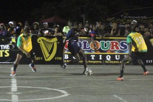 Scenes between Bent Street (yellow) and Holmes Street Tiger Bay in the 2016 edition of the Guinness ‘Greatest of the Streets’ Football Championship at the National Cultural Centre Tarmac