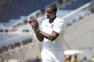 Jason Holder grabbed the key wicket of Sikandar Raza on a day when success was rare 