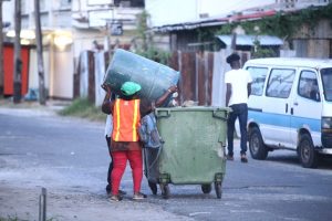 City workers during garbage collection 