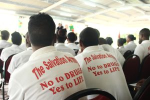 Youths from the Salvation Army Drug Rehabilitation Centre at the Georgetown Club yesterday for the annual launch of the Salvation Army’s Christmas Kettle appeal (Keno George photo)
