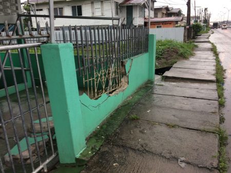 The section of Fizul Razac’s fence which was damaged early yesterday morning following yet another vehicular accident
