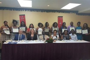 Some the cardiac nurses who received their certification on Wednesday evening during the simple graduation exercise at Cara Lodge. Seated in front of them are (from left to right): Dr. Wayne Warnica, Co-director, GPACC Programme; Dr Karen Then, University of Calgary Instructor; CEO of the GPHC Brigadier George Lewis; Deputy CEO of the GPHC Elizabeth Gonsalves; Assistant Director of Nursing Celeste Gordon; and Registrar, Cardiology Unit, GPHC Dr. Terrence Haynes.