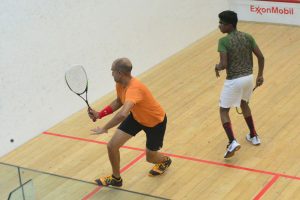 Action from last night in the Lucozade Handicap Squash Tournament. Ryan Rahaman, +10, (left) attempting to make a backhand stroke in his match with Daniel Islam, -5. Islam won 15 – 10, 8 – 15, 15 – 12 (Orlando Charles photo)