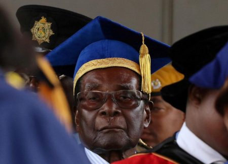 Zimbabwe President Robert Mugabe attends a university graduation ceremony in Harare, Zimbabwe. REUTERS/Philimon Bulawayo