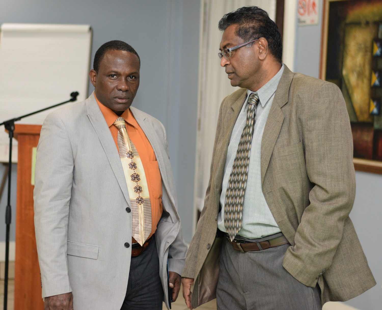 Minister of Public Security Khemraj Ramjattan (right) and Crime Chief (ag) Paul Williams at the Grand Coastal workshop (DPI photo)