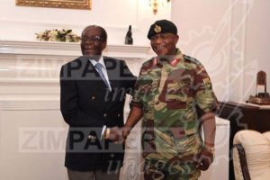 President Robert Mugabe poses with General Constantino Chiwenga at State House in Harare, Zimbabwe. — ZIMPAPERS/REUTERS 