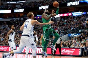 Kyrie Irving scores a layup for two of his 47 points against the Dallas Mavericks Monday night