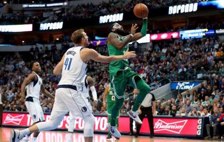 Kyrie Irving scores a layup for two of his 47 points against the Dallas Mavericks Monday night