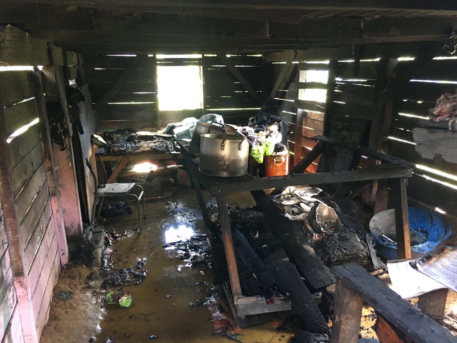 The charred remains of the bottom flat of Allison McCurdy’s home at Supply, Mahaica (Dhanash Ramroop photo) 
