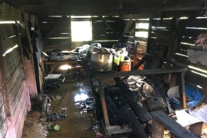 The charred remains of the bottom flat of Allison McCurdy’s home at Supply, Mahaica (Dhanash Ramroop photo)

