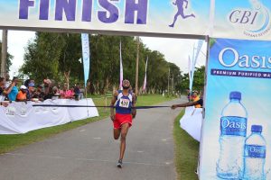 Winston Missigher is all alone as he wins the Oasis 5K road race yesterday. (Orlando Charles photo)