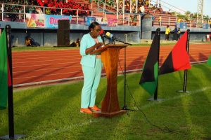 Minster of Education, Nicolette Henry speaking yesterday at the opening ceremony of the 57th National Schools Cycling, Swimming and Track and Field Championships at the National Track and Field Centre.