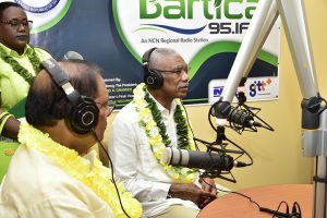 President David Granger (right)  and Prime Minister Moses Nagamootoo go live on air as Minister Simona Broomes looks on. (Ministry of the Presidency photo)