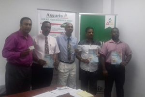 (From left) Aleem Hussain, Managing Director of NexGen Marketing; Yogindra Arjune, General Manager of Assuria; Erwin Daniels, Head of Life Department, Assuria; Stephen Narine, proprietor of Steve’s Jewelry; Damian Singh, Internal Auditor of National Hardware at the launch of the multi-discount rewards programme on Thursday.