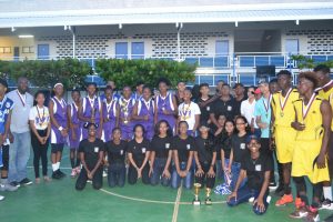 Plaisance High School and President’s College were the respective winner’s in the Boys and Girls divisions of the recent weekend basketball tournament hosted by the Marian Academy’s Physical Education Class of 2018. The intense two day Under-17 competition was held on the Marian Academy’s all-purpose court and contested among St. Roses High School, Plaisance High School, President’s College and the hosts. Nigel Bowen of Plaisance High and President’s College’s Saffiya Green were selected as the Most Valuable Players, in the Boys and Girls categories, respectively. The winners and participating teams are all smiles (above) following the presentation ceremony. (Courtesy of Loren Black, Marian Academy)