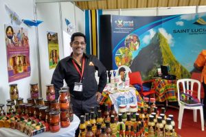 Ronald Ramjattan poses with some of his products