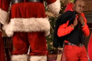 Quincy Lacon dressed as Santa Clause in the music video for his new hit.