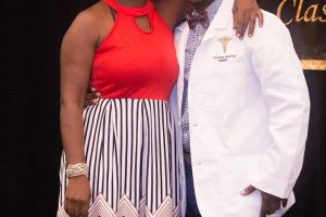 Dr Triston Griffith with his mother, Nickole Lewis, at his White Coat ceremony in November. 