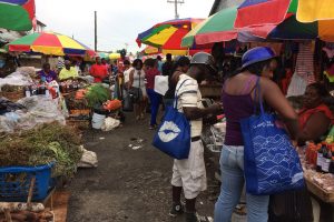 Getting the final ingredients: Shoppers yesterday congregated at the Bourda Market to purchase items for their Christmas meal.
