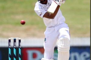 Roston Chase drives during his top score of 64 an innings which included seven fours and came off 88 balls. (Photo courtesy CWI Media)